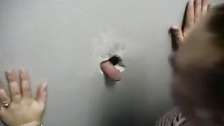 My girlfriend gets facial in a glory hole action