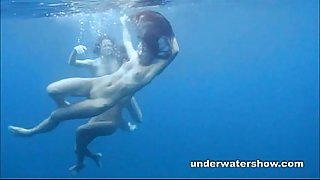 3 girls stripping in the sea