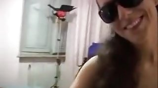 Italian slut bonks while wearing sun glasses.