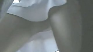 Voyeur video quick white chick in a white skirt and pretty ass